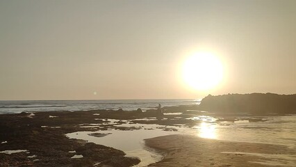 a view of the sunset in the afternoon in Canggu Bali, Bali on August 17, 2023