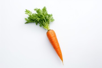 Fresh carrot with green leaves isolated on white background. Healthy food and vegetables