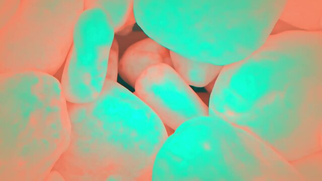 Fluorescence microscopy. Microscopic examination. Medical examination with contrast agent. Laboratory research, lab test. Biology science concept. Cyan orange acid colors abstract texture background