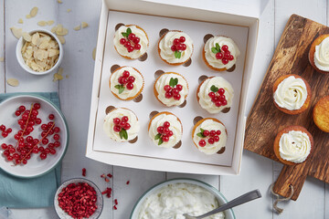 Cooking seasonal cupcakes with red currant