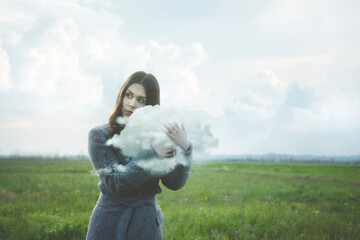 magical surreal moment of a woman warmly hugging a cloud