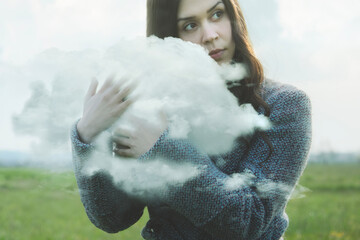 dreamy woman hugs a cloud, abstract concept