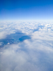 Bay seen through clouds from the sky (Mutsu Bay, Aomori, Japan)