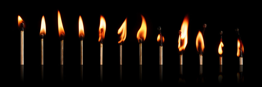The stages of match burning on a black background. Safe match with red head. Different stages of matchstick burning.