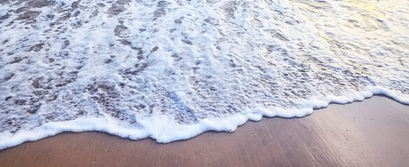 sea foam on the sand abstract background abstract water ocean