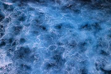 sea waves foam drone view abstract background ocean top