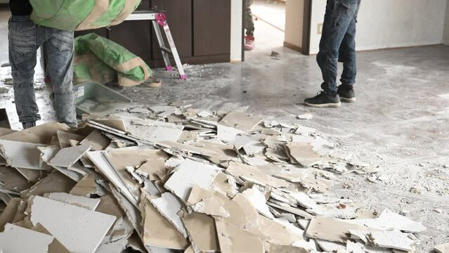 Professional craftsmen onsite, such as demolition companies that break ceilings and exterior walls of detached houses No face