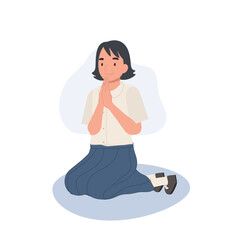 Thai Culture concept. Thai student girl is sitting and praying , making wai. Praying Gesture