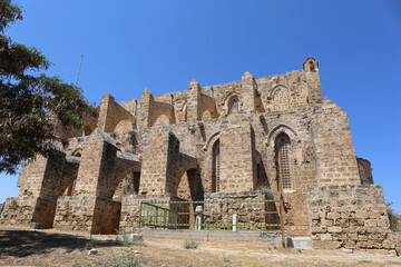 Side View of Church of St. Peter and Paul aka Bugday Mosque with a Ottoman Tomb in Famagusta, North Cyprus