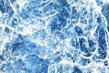 Obraz premium Ocean wave background. Bubble water backdrop. Turbulent sea texture. Messy water flow. Depth of the sea. Water foam surface backdrop.