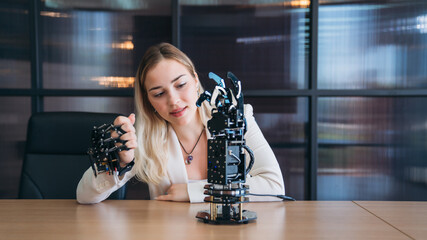 College Young students research inventions robotics and robot arm. Experiments and digital automation software.