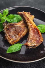 lamb cutlet on the bone fresh meat portion food ready to eat healthy appetizer meal food snack on the table