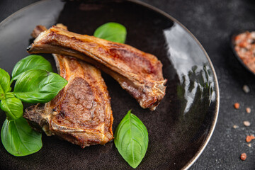 lamb cutlet on the bone fresh meat portion food ready to eat healthy appetizer meal food snack on the table