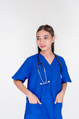 Portrait of a young and skilled medical student, nurse, intern posing with both hands inside pockets. Isolated on a white background.