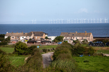 Fototapeta na wymiar Windpower at the Coast of the Irish Sea