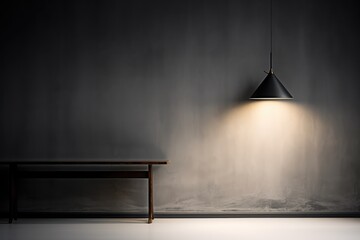 Gray wall with illumination from a black metal lamp. Universal modern background for presentation.