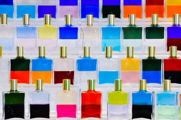 Aura-Soma bottles and products on display at a holistic and spiritual fair.