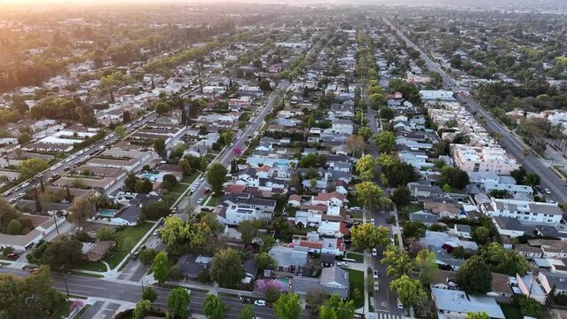 Sprawling suburban homes in California. Aerial drone video flying over middle class neighborhoods in America.