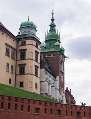 Obraz premium Ancient Polish castle in Cracow called Wawel. Exterior elements of the palace, king's place.