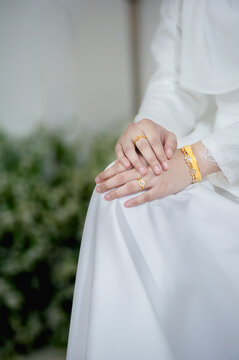 close up hand muslim bride in white dress catch the wedding ring.concept for wedding card background, poster,Invitation card