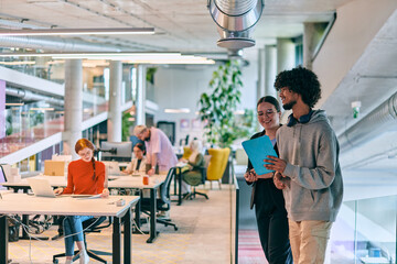 In a modern startup office, a diverse group of young professionals collaboratively tackles various business problems and challenges, surrounded by their engaged colleagues, fostering innovation and