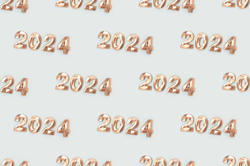Pattern made of 2024 golden numbers on a blue background. New Year concept.