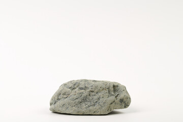 Gray flat textured stone pedestal on white background, template for mock-up, banner. Minimal concept, empty podium display product, presentation scene .