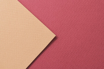 Rough kraft paper background, paper texture red burgundy beige colors. Mockup with copy space for text.