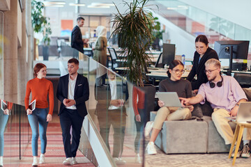 In a modern startup office, a diverse group of young professionals collaboratively tackles various business problems and challenges, surrounded by their engaged colleagues, fostering innovation and