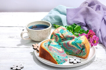 Apple pie in unicorn colors ready to eat. Homemade baking, nostalgic food. Hard light, dark shadow