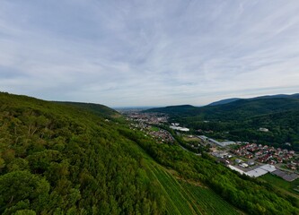 Fototapeta na wymiar Aerial Panorama of Florival Valley Entrance: From Buhl to Guebwiller - Summer Evenings in Alsace, France. A Wide Angle Horizon of Vineyards, Forests, and Mountains of Haut-Rhin Villages