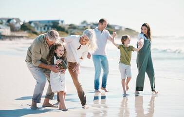 Grandparents, children and big family with play at beach, comic laugh or bonding for love, sunshine...
