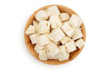 diced celery root in wooden bowl isolated on white background. Top view. Flat lay.