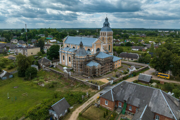 aerial view over othodox or catholic church in countryside