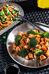 Chinese food with broccoli, fresh vegetable and nudle - 645355235