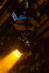 Television studio light shining warm beam of light