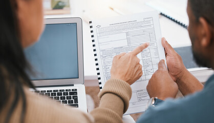 Hands, insurance documents and couple reading with laptop, pointing and financial decision in home....