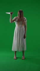 Full-size vertical green screen, chroma key shot of a posessed female, woman figure, ghost,...