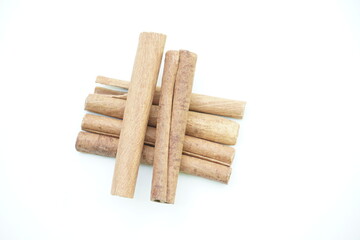 Cinnamon sticks isolated on white background, top view