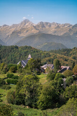 Fototapeta na wymiar Beautiful view of the village in the mountains on a sunny day in the Ariege Pyrenees in southwest France