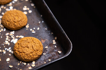 oatmeal cookies on a tray from the oven
