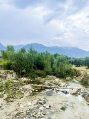 Fototapeta na wymiar view of the Alburni mountains with a stream of a natural source