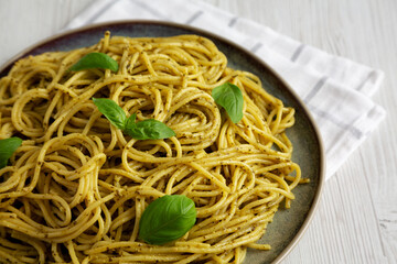 Homemade Vegan Pesto Pasta on a Plate, side view.