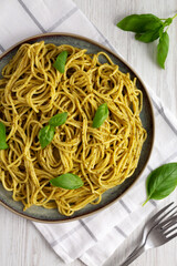 Homemade Vegan Pesto Pasta on a Plate, top view. Flat lay, overhead, from above.