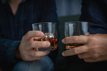 alcoholism alcohol addiction and people's ideas Alcoholic man with flask and drinking whiskey at home, businessman in luxury suit with glass of whiskey Elegant drink concept