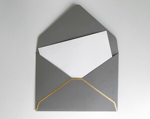 Silver envelope with a white liner for congratulations on a white background. Wedding invitation,...
