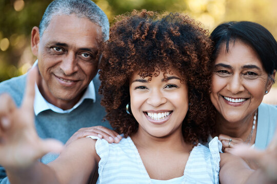 Selfie, Portrait And Woman With Senior Parents In An Outdoor Park For Adventure, Holiday Or Weekend Trip. Happy, Smile And Young Female Person Taking Picture With Her Elderly Mom And Dad From Mexico.