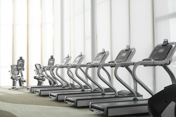 Fitness gym or sport club with equipment for indoor workout exercise. empty people, use as sport room background concept.