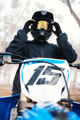 Naklejka premium Sports, dirt bike and speed with person on motorcycle in forest for challenge, training and performance. Fast, fitness and freedom with man riding in nature for travel, journey and adventure
