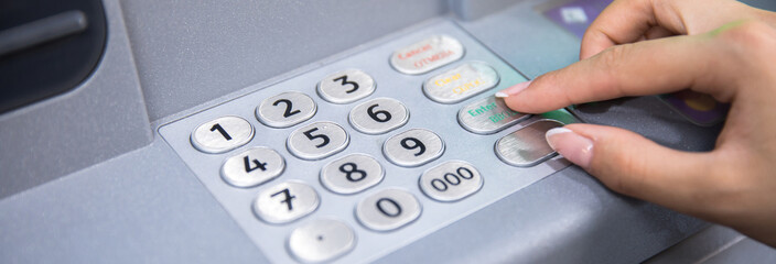 woman in ATM/bank machine